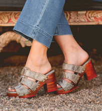 Load image into Gallery viewer, Woman wearing gray Enticing by Bed Stu leather clog sandal.
